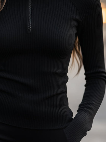 Sophisticated Black Ribbed Turtleneck Top with Zipper Detail